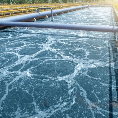 An aerial photo of some water catchment at a wastewater treatment plant.